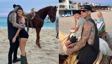 Travis Barker curte praia com Kourtney Kardashian: 'Dia perfeito'