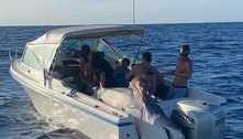 Pescadores pegam tubarão quase tão grande quanto o barco deles