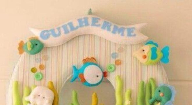 Use a guirlanda de feltro com temas divertidos para o quarto de bebê