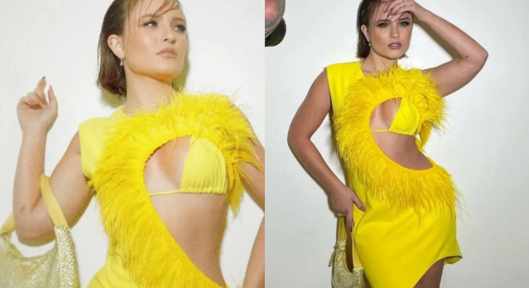 Larissa elegeu um visual de quase R$ 20 mil para comparecer a um evento em 2022. O vestido amarelo com plumas é vendido por cerca de R$ 5.000, enquanto a bolsa de cristais de uma grife italiana sai por R$ 15 mil