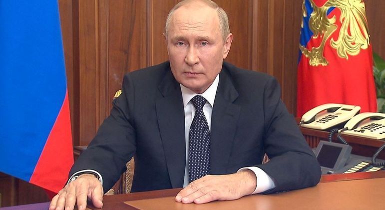 O presidente Vladimir Putin durante seu discurso na TV russa