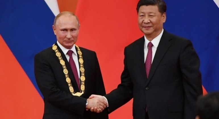 O presidente russo Vladimir Putin e o presidente chinês  Xi Jinping
